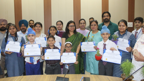 The-Deputy-Commissioner-Honored-52-Students-With-Certificates-And-Plants-For-Their-Excellent-Artwork